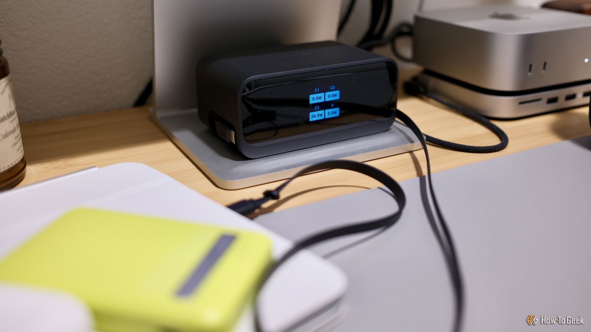 Anker Nano Charging Station (7-in-1, 100W) sitting on a desk.